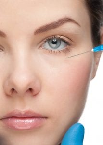 woman receiving under eye wrinkles botox injection